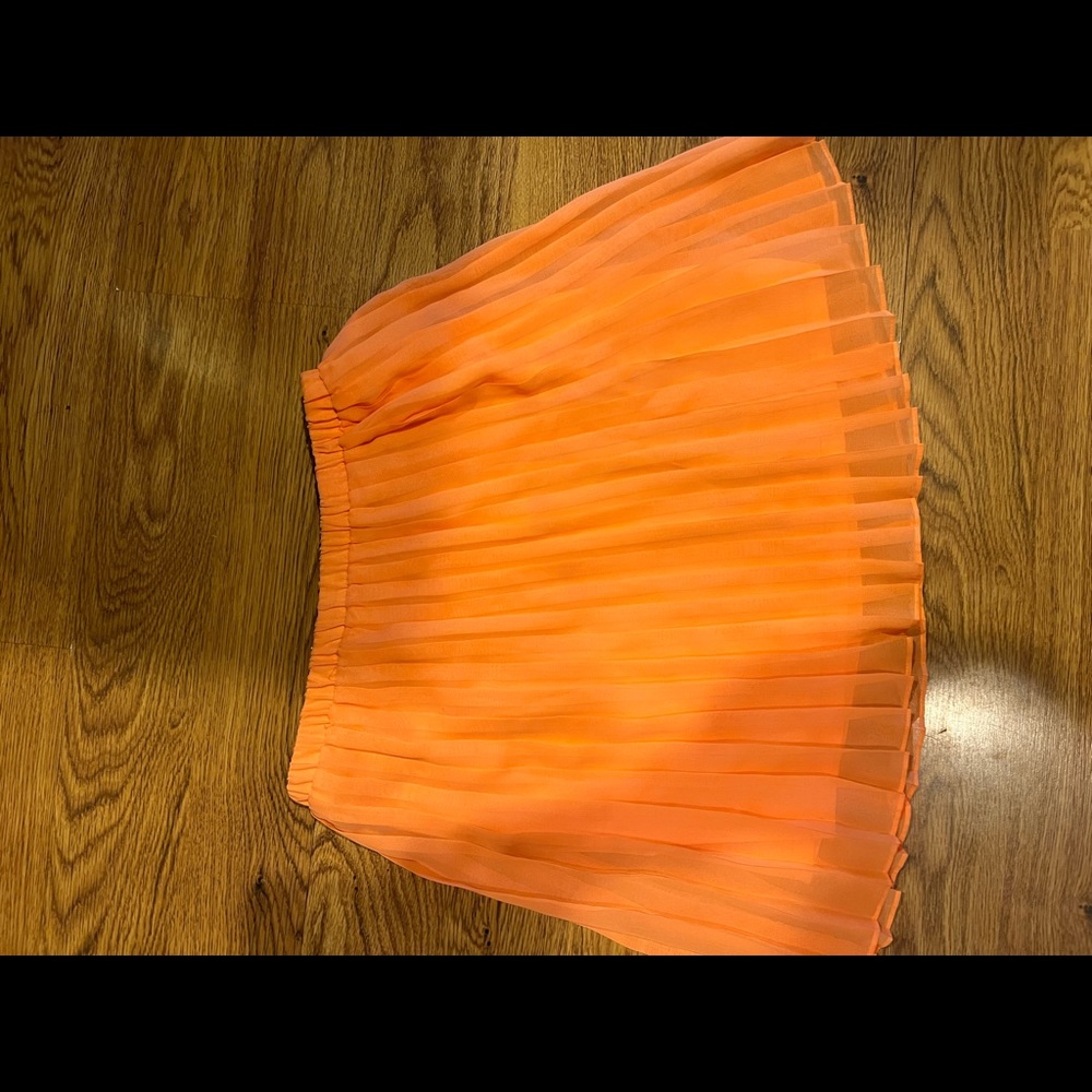 Neon orange skirt